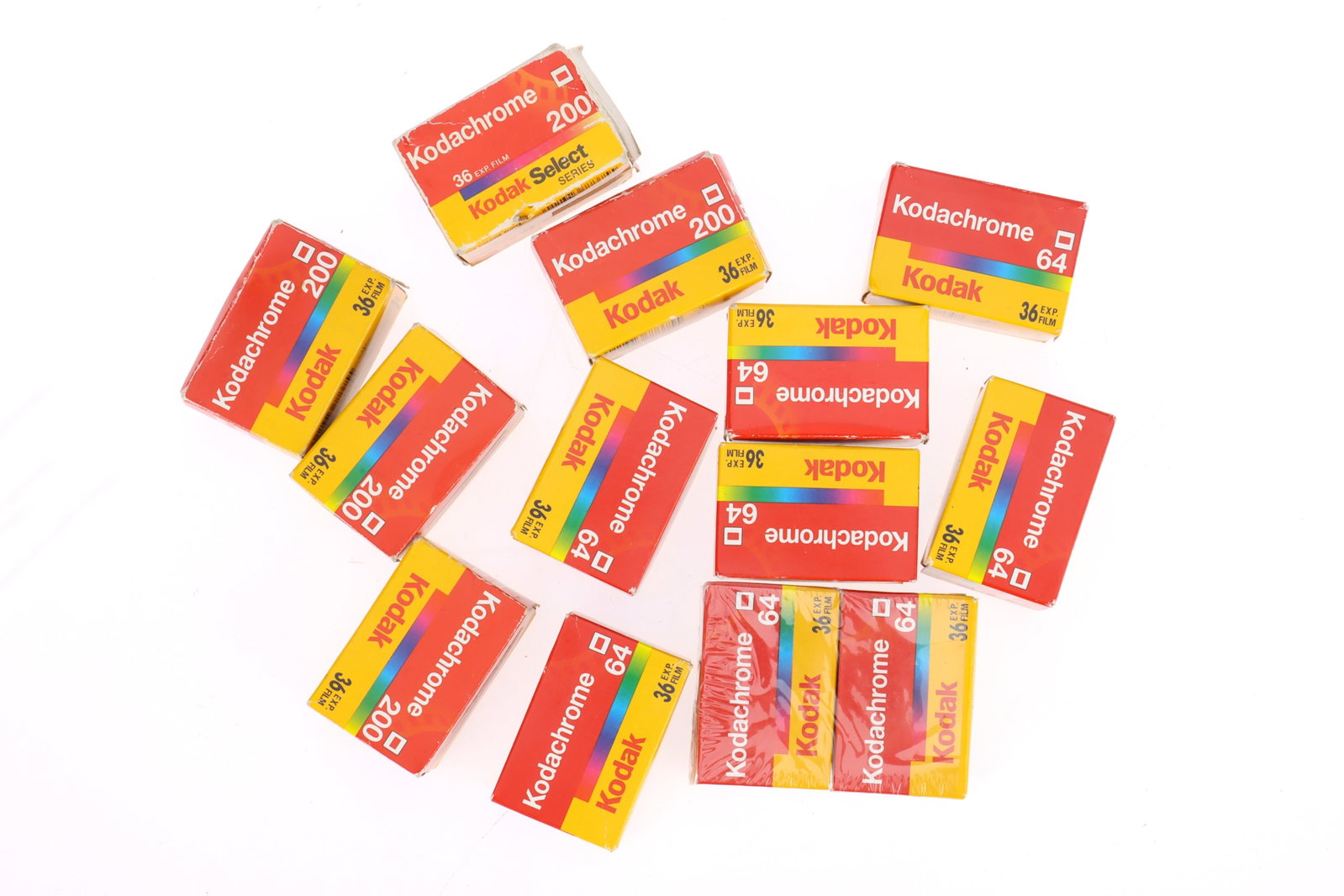 A Quantity of Expired 35mm Kodachrome Slide Film,: A Quantity of Expired 35mm Kodachrome Slide Film, a total of 13 rolls, sealed in boxes, mix of ISO200 and ISO64, expiry dates 2005/2006.