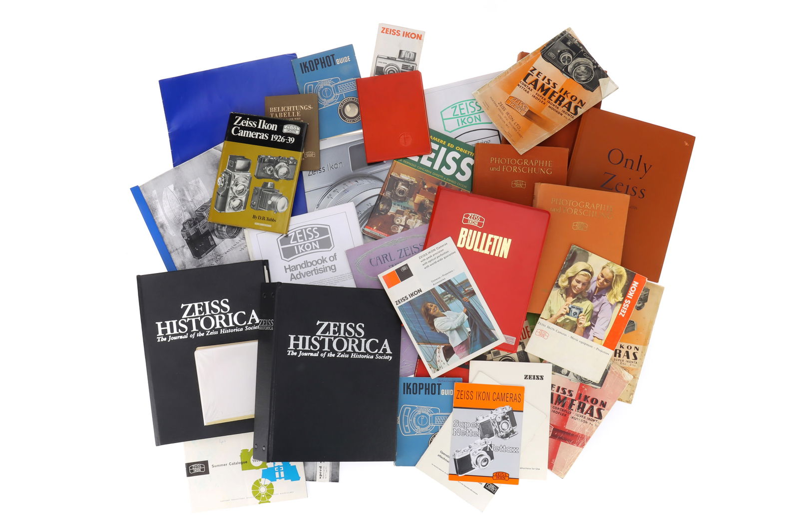 A Large Selection of Zeiss Ikon Literature,: A Large Selection of Zeiss Ikon Literature, to include copies of Zeiss Historica, manuals, guides and photobooks.