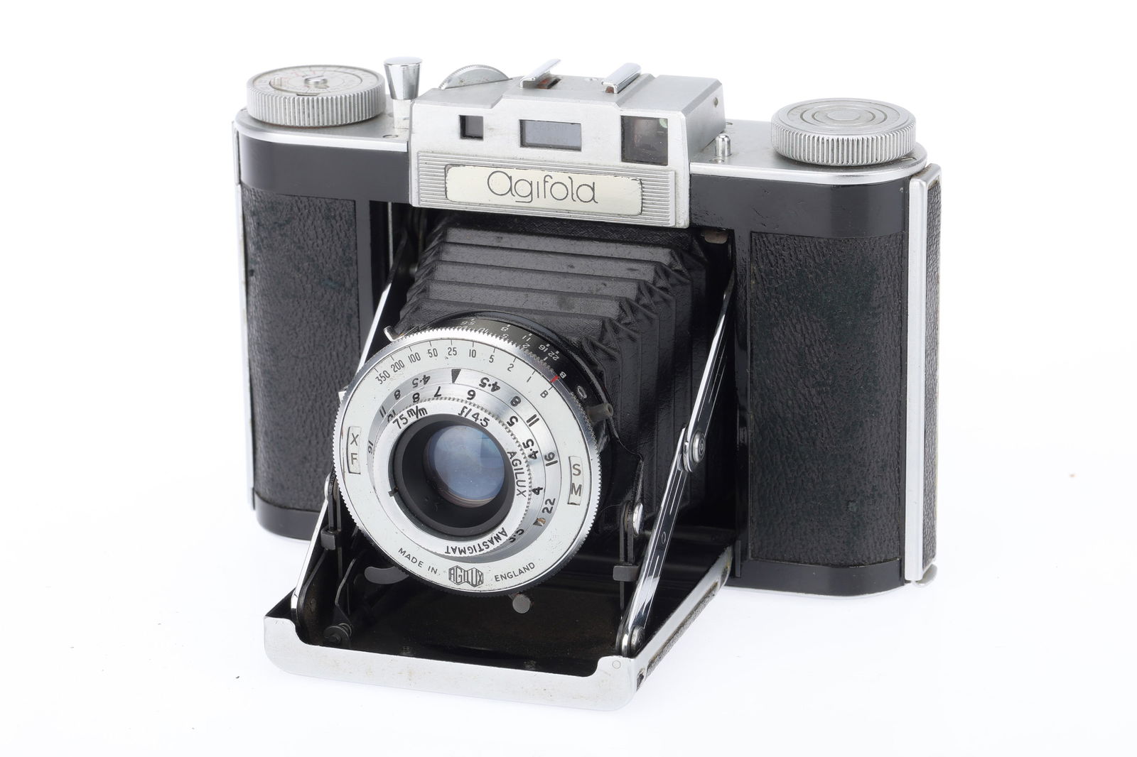 An Agilux Agifold Medium Format Camera,: An Agilux Agifold Medium Format Camera, black, serial number 08009, body G-VG, shutter working, bellows extends and locks, not light tested, advance works, with f/4.5 75mm lens, optics F-G with light