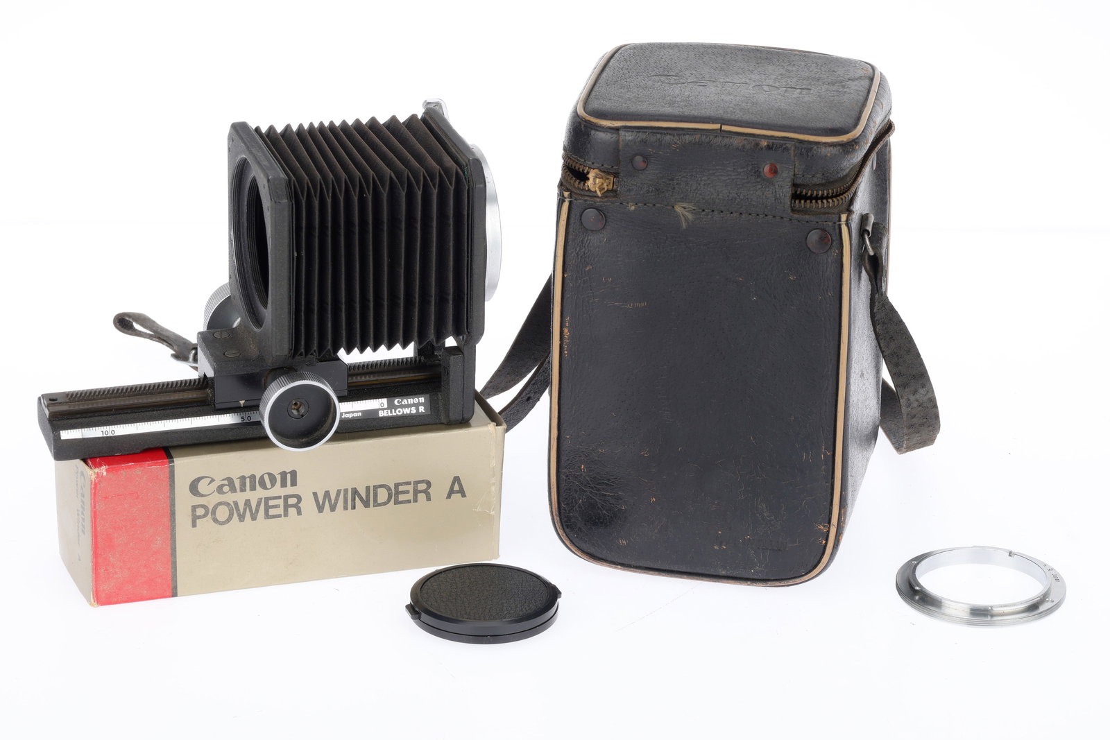 A Canon Bellows R,: A Canon Bellows R, black, bellows extend and appear in good condition, not light tested, with a screw mount adaptor, in a semi-rigid case.