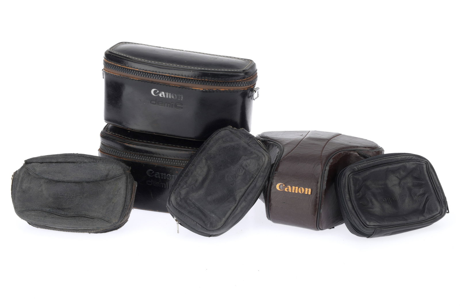 A Group of Camera Cases,: A Group of Camera Cases, to include two Canon Demi C cases, G, a Canon ERC, and some soft cases.