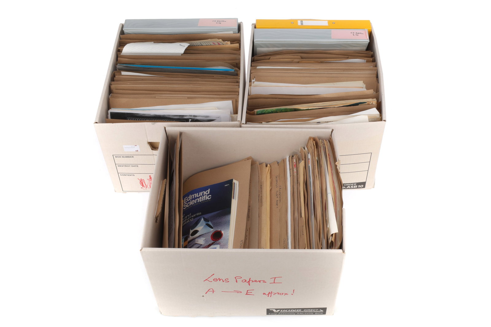 A Large Quantity of Lens Reference Literature,: A Large Quantity of Lens Reference Literature, comprising a large amount of filed literature from most lens manufacturers, appears to have been compiled for reference in the researching and writing of
