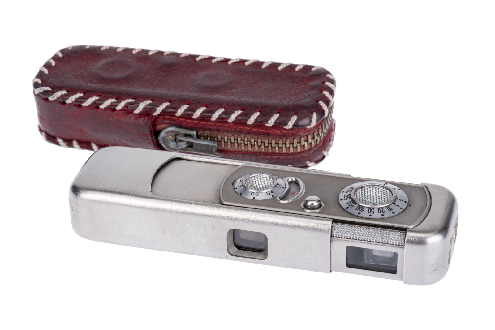 A Minox VEF Riga Sub-Miniature Camera: 1937, three-tooth, serial no. 16558, with Minostigmat f/3.5 15mm lens, body, VG, shutter working, lens, VG, in hand-made case