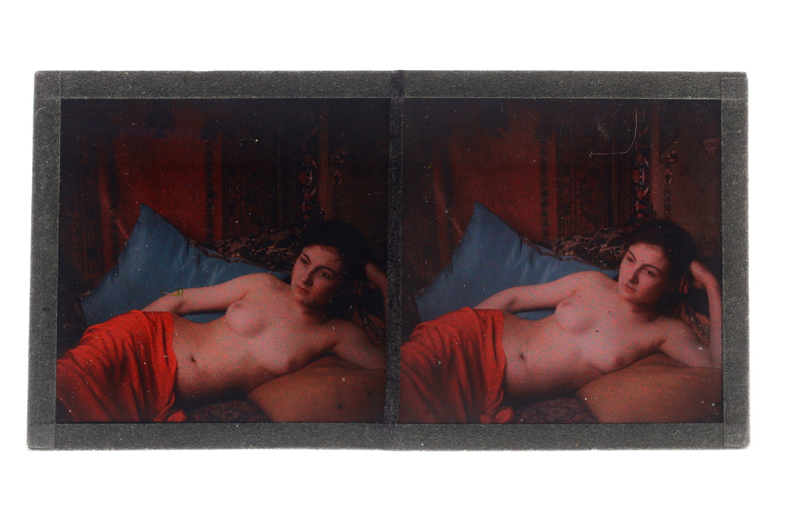 An Erotic Nude Autochrome Stereoview, 1920's: c.1920, colour glass plate images of semi-reclining nude with dark hair, 12.9cm x 6.8cm overall
