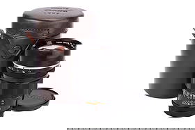 A Canon f/2 100mm Lens,: Leica Screw Mount, black, serial no. 13001, body, VG-E, elements, VG-E, in maker's leather case Note: Marked 'E.P' Note: A 5% import VAT applies to this lot for UK bidders only. International buyers a