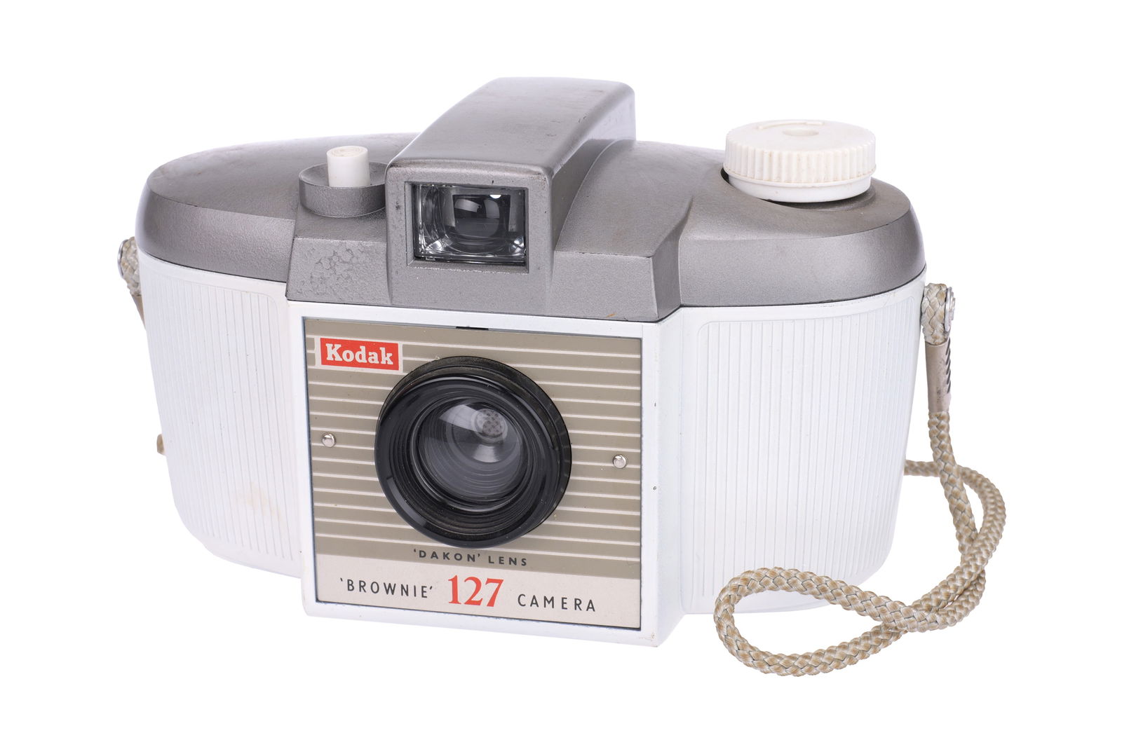 A Kodak 'Albino' Brownie 127 Camera,: 1953-1959, white, body, VG-E, lens, VG-E Notes: This 'Albino' version with a white body and a grey top was produced for field testing. About 5,000 cameras were produced and sold in the UK Channel Isla