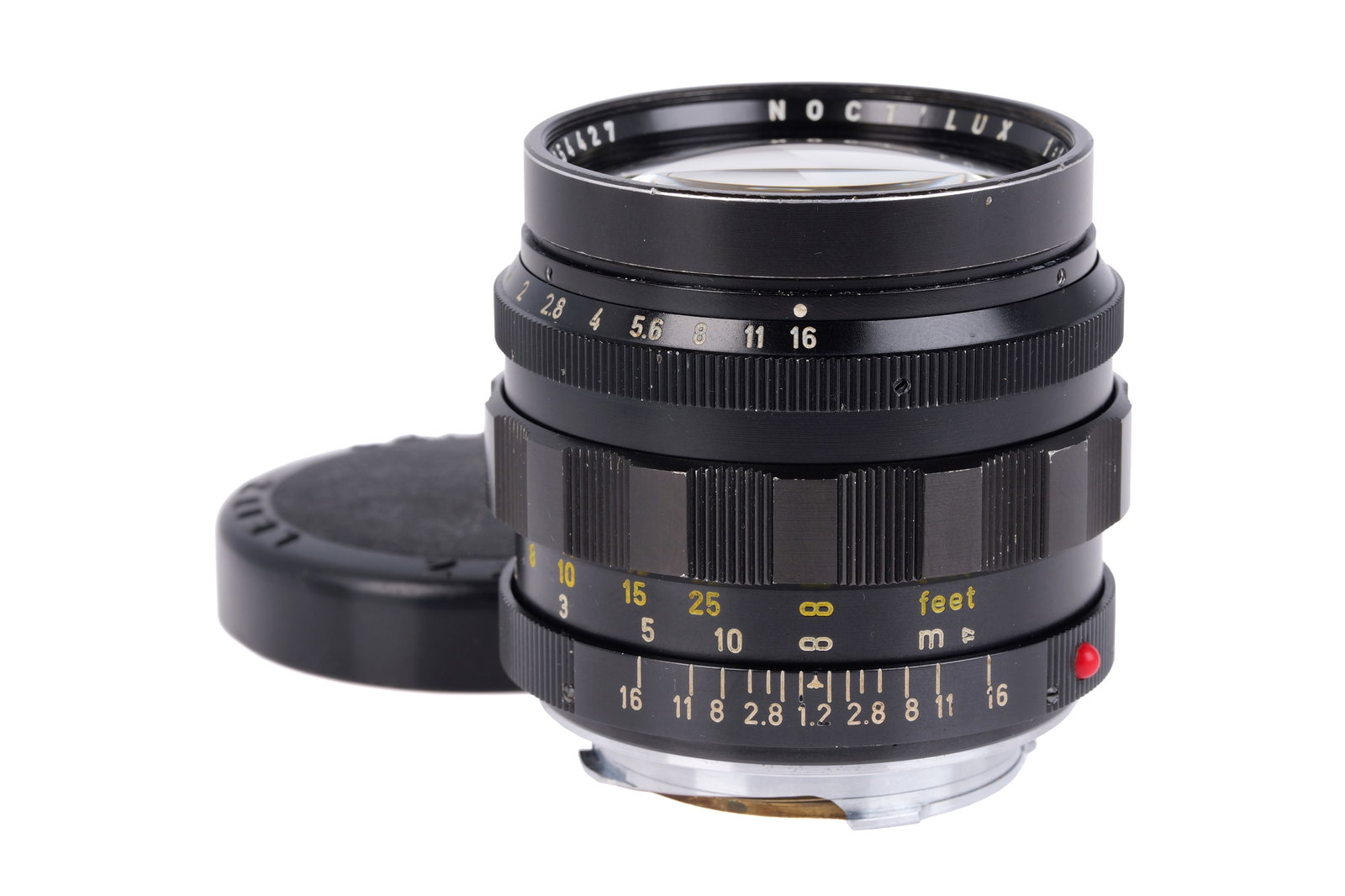 A Leitz Noctilux f/1.2 50mm Lens,: black, serial no. 2254427, body, VG, elements, complete with maker's lens cap