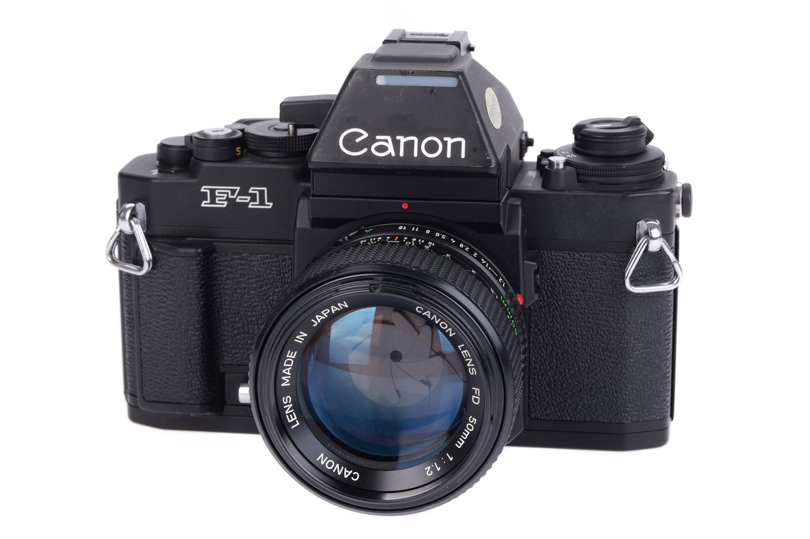 A Canon F-1 New SLR Camera,: 1981, black, serial no. 212124, with Canon FD f/1.2 50mm lens, black, serial no. 49716, body, G-VG, shutter working, lens, VG