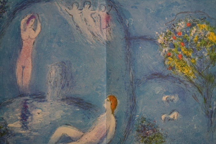 Chagall - Daphnis and Chloe In The Cave of the NYMPHS ?After?: Artist: Marc ChagallTitle: Daphnis and Chloe In The Cave of the NYMPHSYear: 1977Dimensions: 19in. by 13inEdition: From the rare limited editionPublisher: The Limited Editions Club INC.Suite: Daphins a