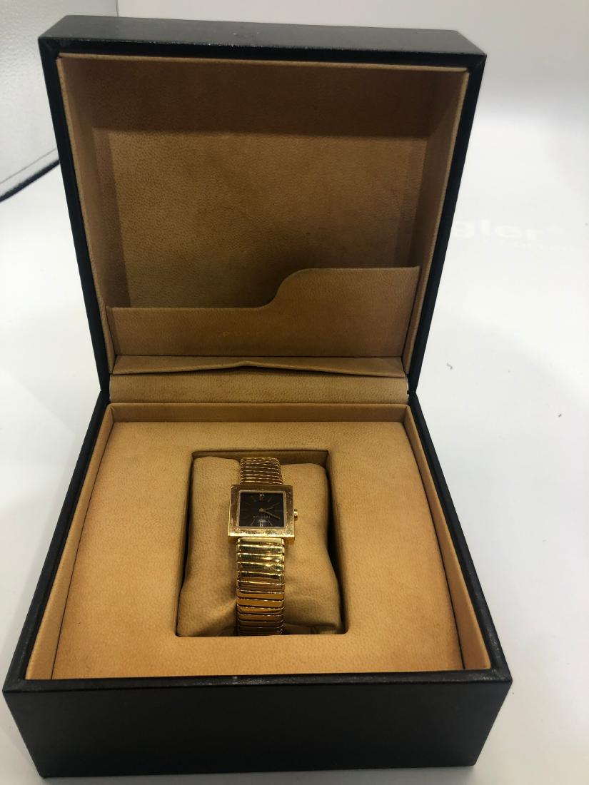 Bvlgari Square Tubogas Yellow 18 K Gold Watch Wristlet: Bvlgari Square Tubogas Yellow 18 K Gold Watch Wristlet. Black dial. Quartz.