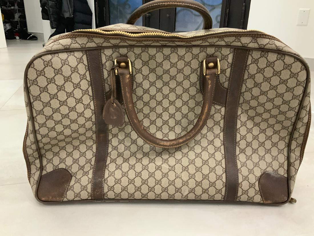 Gucci Vintage Canvas Travel Weekender: Brand: Gucci Model: Vintage Tan GG Mono Canvas Travel Weekender Condition: Vintage Date/Serial code Available on Request 100% authenticity guaranteed