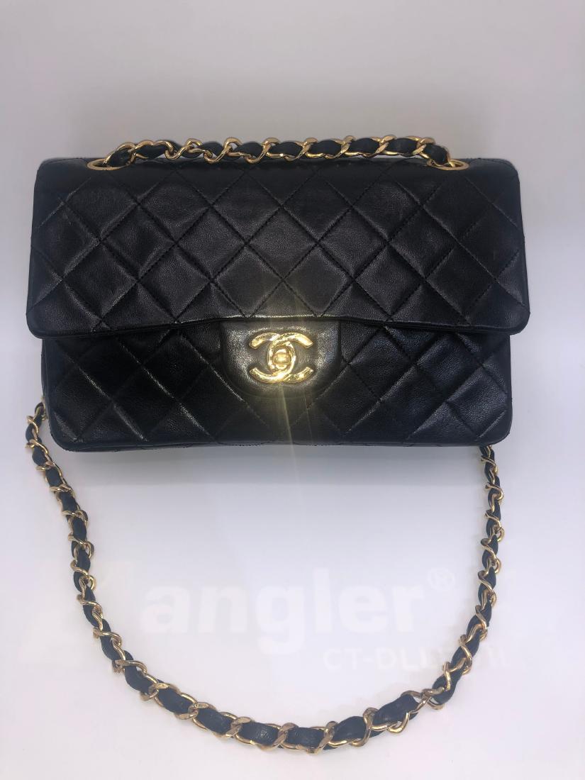 Chanel black quilted bag with gold hardware (1 of 10)
