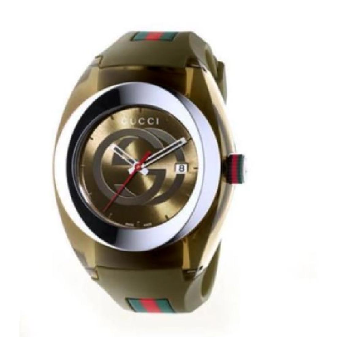 Gucci Sync XXL Green Rubber Green Dial Watch YA137106: Gender: Men's Band Type: Two-Piece Strap Case Color: Green MPN: Does Not Apply Case Material: Rubber Band Color: Green Movement: Quartz Display: Analog Band Material: Rubber Brand: Gucci Year of Manuf