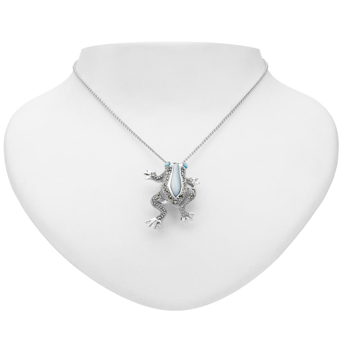 Blue Mother of Pearl and Marcasite Frog Pendant: Ribbit! This delightful frog pendant necklace is beautifully detailed in oxidized sterling silver and adorned with striking blue mother-of-pearl and sparkling marcasite to create a fun, whimsical desi