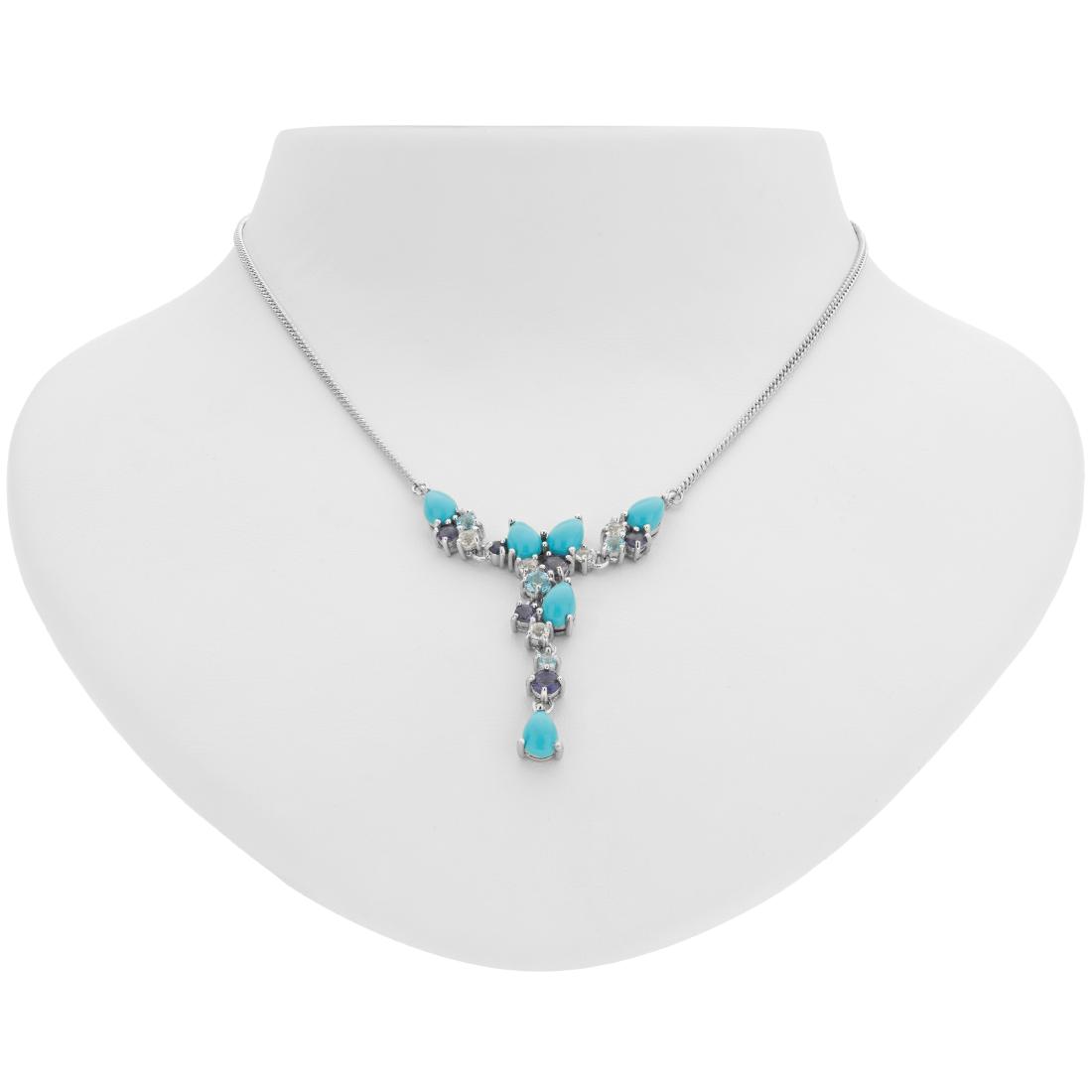 Sonora Beauty Turquoise White Topaz and Iolite Necklace: 925 Sterling Silver Heavenly color, graceful styling and outstanding craftsmanship make this Y necklace from Pangea Mines a “must have.” A profusion of gorgeous pear cut Sonora Beauty turq