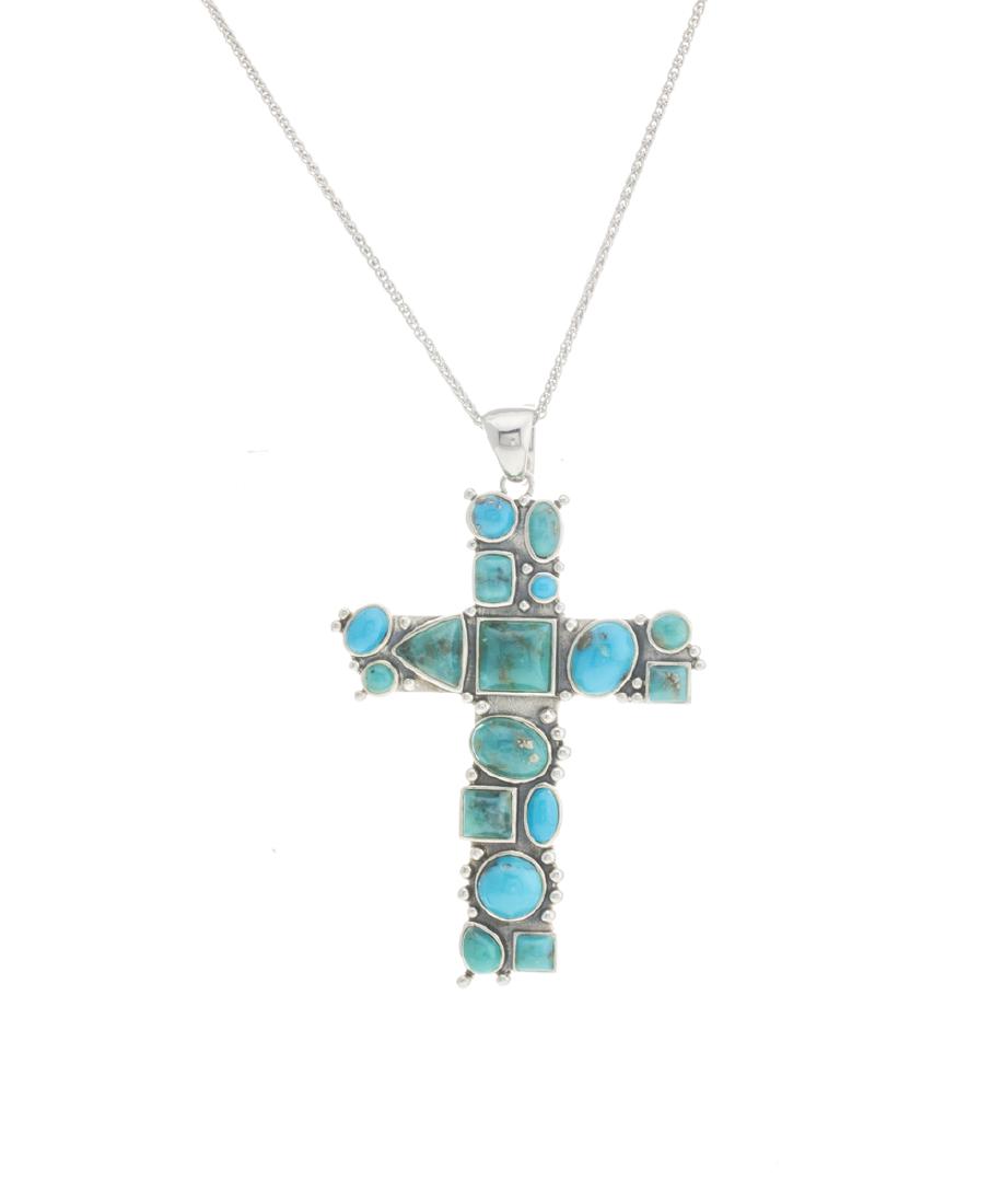 Campo Frio Turquoise South Western Cross Pendant: Heavenly Campo Frio Turquoise is beautifully paired with 925 sterling silver to create an absolutely eye-catching pedant, one that will certainly garner attention and compliments. Beautifully crafted 