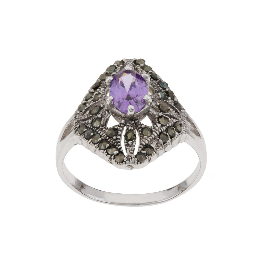 Romilly Amethyst-Look and Genuine Marcasite Ring: This elegant multi stone ring features a single amethyst-look cubic zirconia centered in a field of shimmering genuine marcasite. Finely crafted of gleaming anti-tarnish rhodium plate on brass and sty