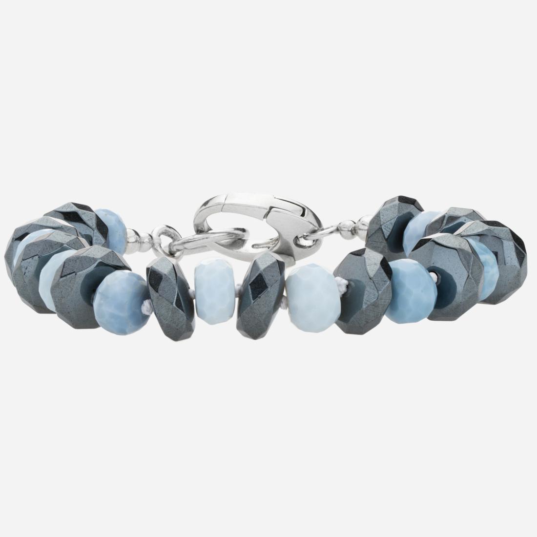 Silver Blue Opal and Hematite Bead Bracelet: Tara Mesa crafts the perfect accent with this lovely rondelle bead bracelet. Hand selected genuine blue opal and hematite gemstones alternate on this striking design to create an interesting juxtaposi