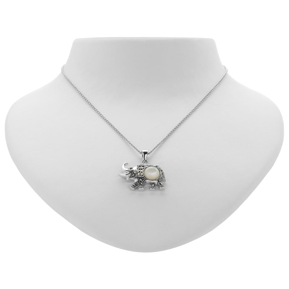 Silver Marcasite, Garnet & MOP Elephant Pendant: New from Addison Lane’s Animal Kingdom, this charming pendant necklace adds a light touch. A symbol of strength and power as well as a good luck totem, this ponderous pachyderm is beautifully cr