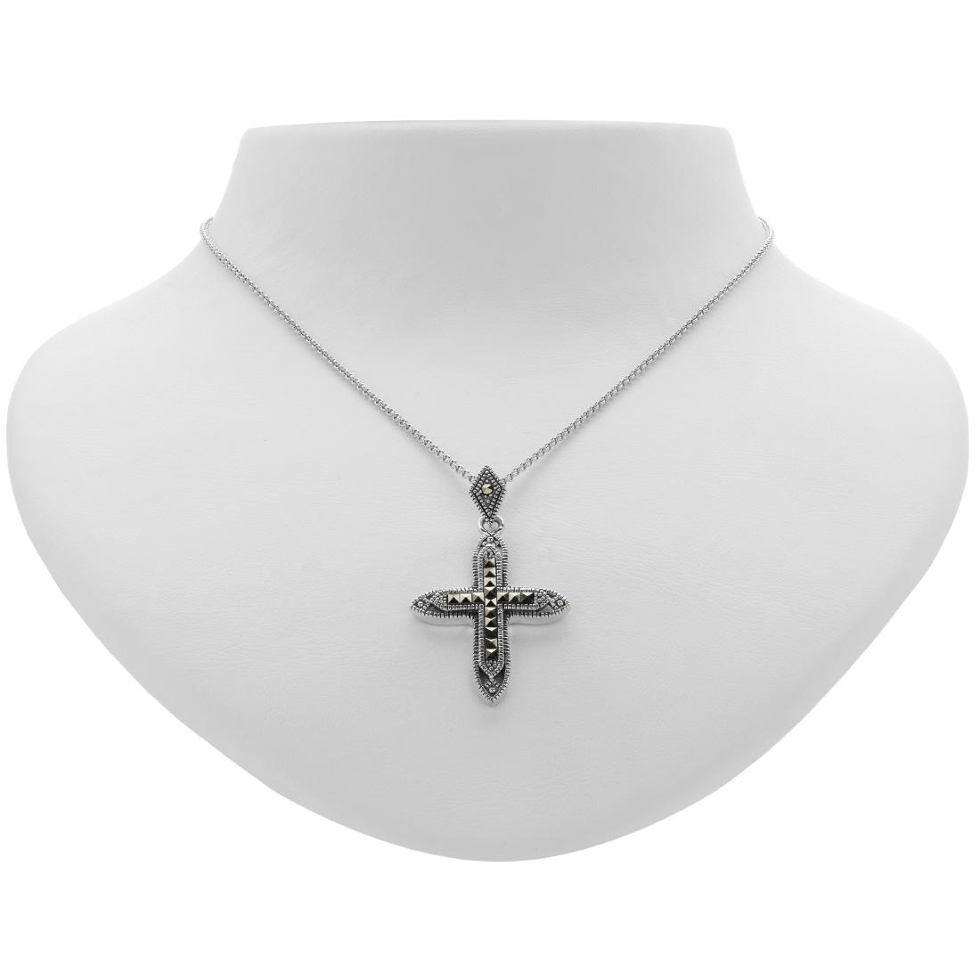 Sterling Silver Marcasite Cross Pendant: Beautiful craftsmanship in oxidized sterling silver makes this cross pendant from the Addison Lane Weekend Collection makes an impressive accent. Styled to drape gracefully, this attractive design inc
