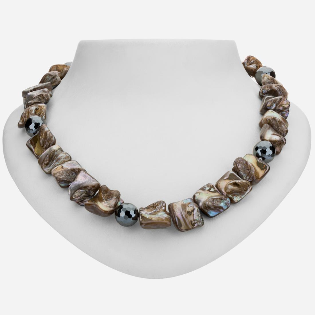 Sterling Silver Abalone & Hematite Bead Necklace: Genuine colorful, ever-changing, iridescent abalone is complemented by faceted hematite that captures and reflects every bit of light to create a lovely 19” necklace. Tara Mesa beautifully craft