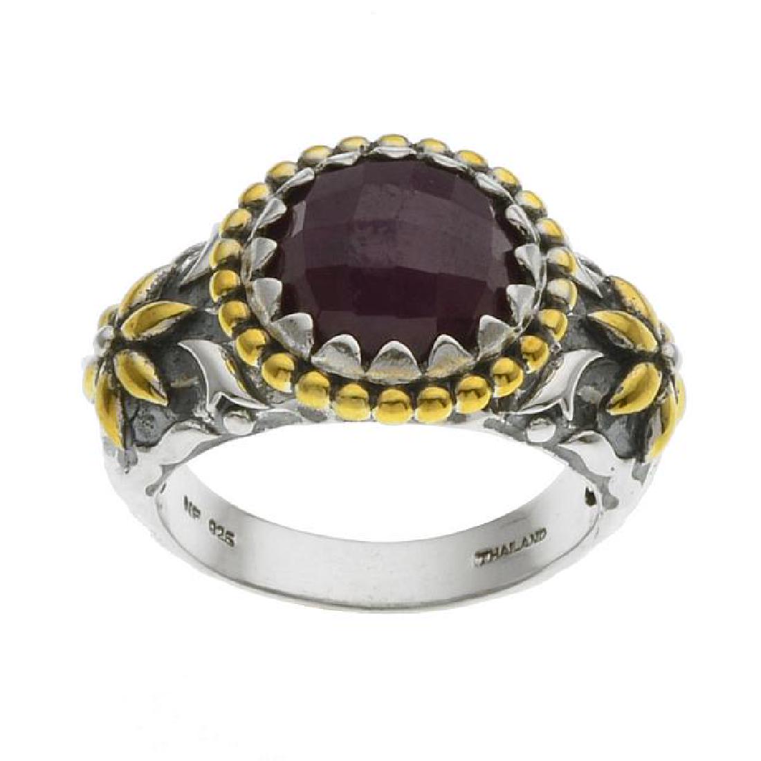 Silver/14k Gold Plate Madurai Ruby Ring-SZ 7: Make a lasting impression with this lovely ring from the Addison Lane Bali Grandeur Collection. Beautifully crafted in oxidized-finish sterling silver with 14k gold plated accents and adorned with a g