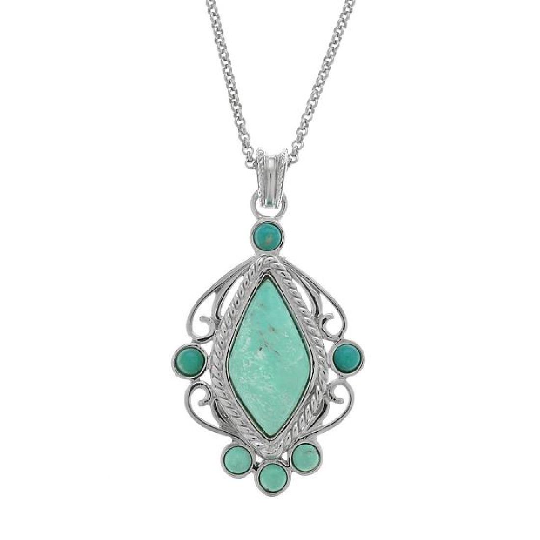 Sterling Silver Campo Frio Turquoise Pendant: â€¢ Genuine Campo Frio Turquoise â€¢ Rope texture around the bezel & scrollwork details â€¢ 18â€ silver chain â€¢ Gleaming rhodium over fine sterling silver