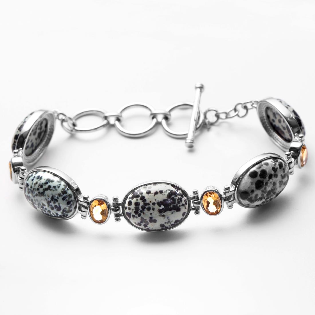 Sterling Silver Augite & Citrine Toggle Bracelet: Add dazzling color and lovely sparkle to your collection with this smart contemporary toggle bracelet from the Pangea Mines Mined in America Collection. Beautifully crafted in fine sterling silver wit