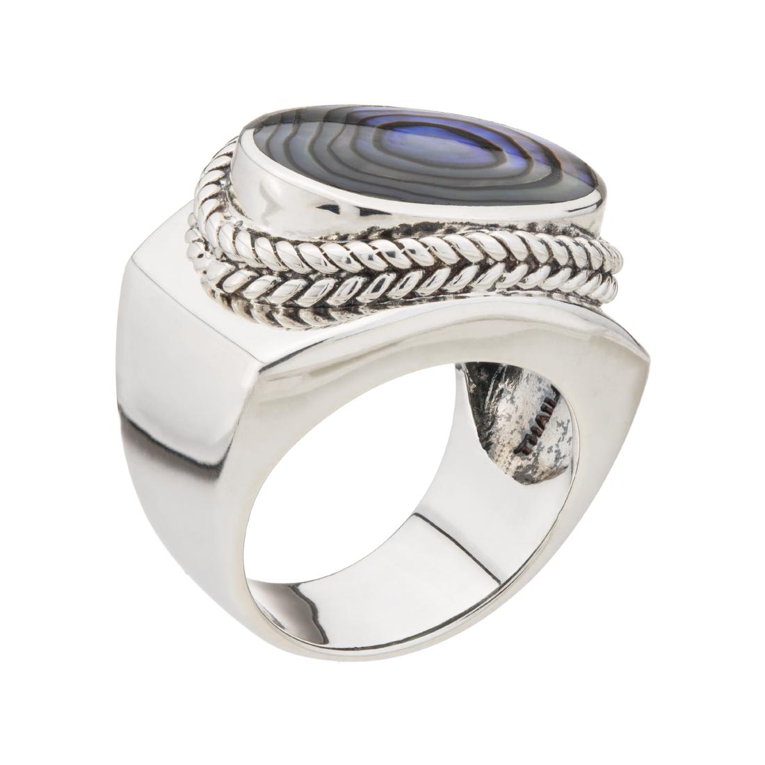 Sterling Silver Oval Abalone East-West Ring-SZ 7: Impressive color, size and luster makes this lovely design from Pangea Mines an eye-catching dazzler! Adorned with an 18 x13mm oval Abalone cabochon, it is beautifully crafted in gleaming sterling sil