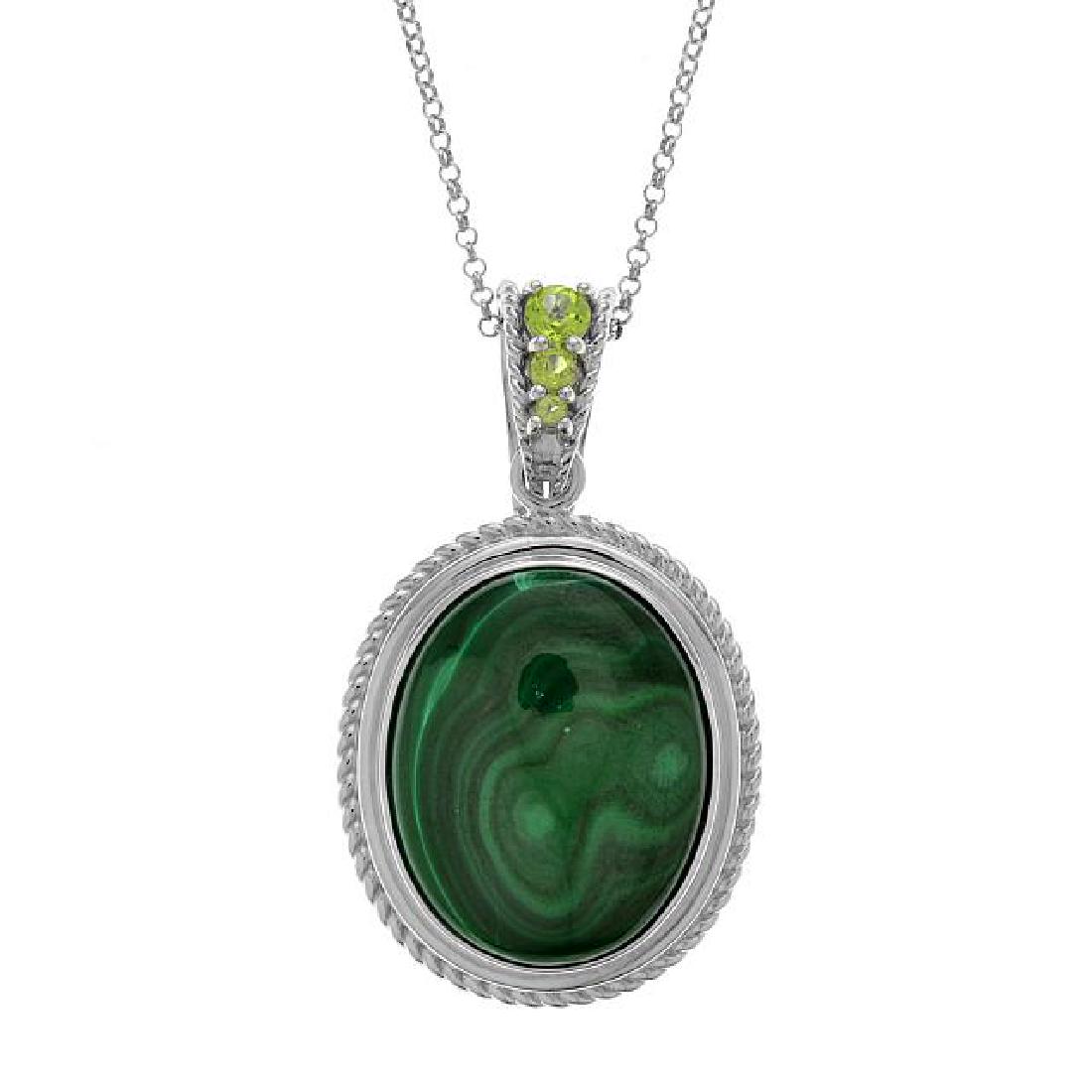 Sterling Silver Oval Malachite & Peridot Pendant: Heavenly! Pangea Mines gorgeous enhancer pendant is adorned with oval gemstones accents on a textured sterling silver setting to create a truly eye-catching design. • Genuine Malachite & Peridot