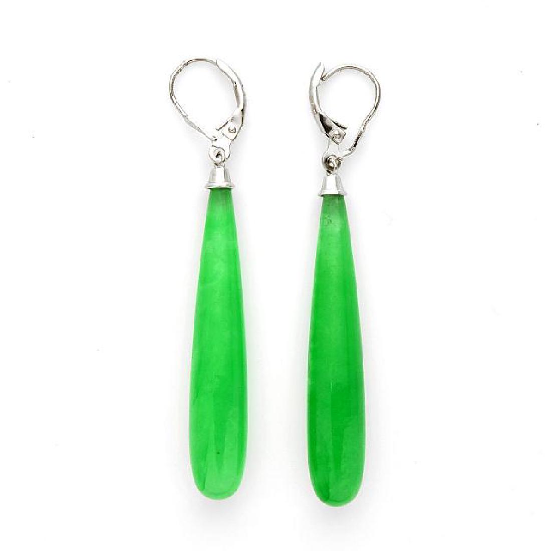 Silver Genuine Green Jade Elongated Earrings: • Genuine green jade • Elongated style • Lever back for comfortable fit • Gleaming rhodium over fine sterling silver