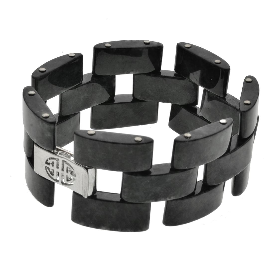 Sterling Silver Genuine Jade Link Bracelet: A striking contemporary design from the Pangea Mines Jade Royale collection—a smart link-style bracelet beautifully crafted in fine sterling silver and adorned with genuine charcoal jade. Add a bril