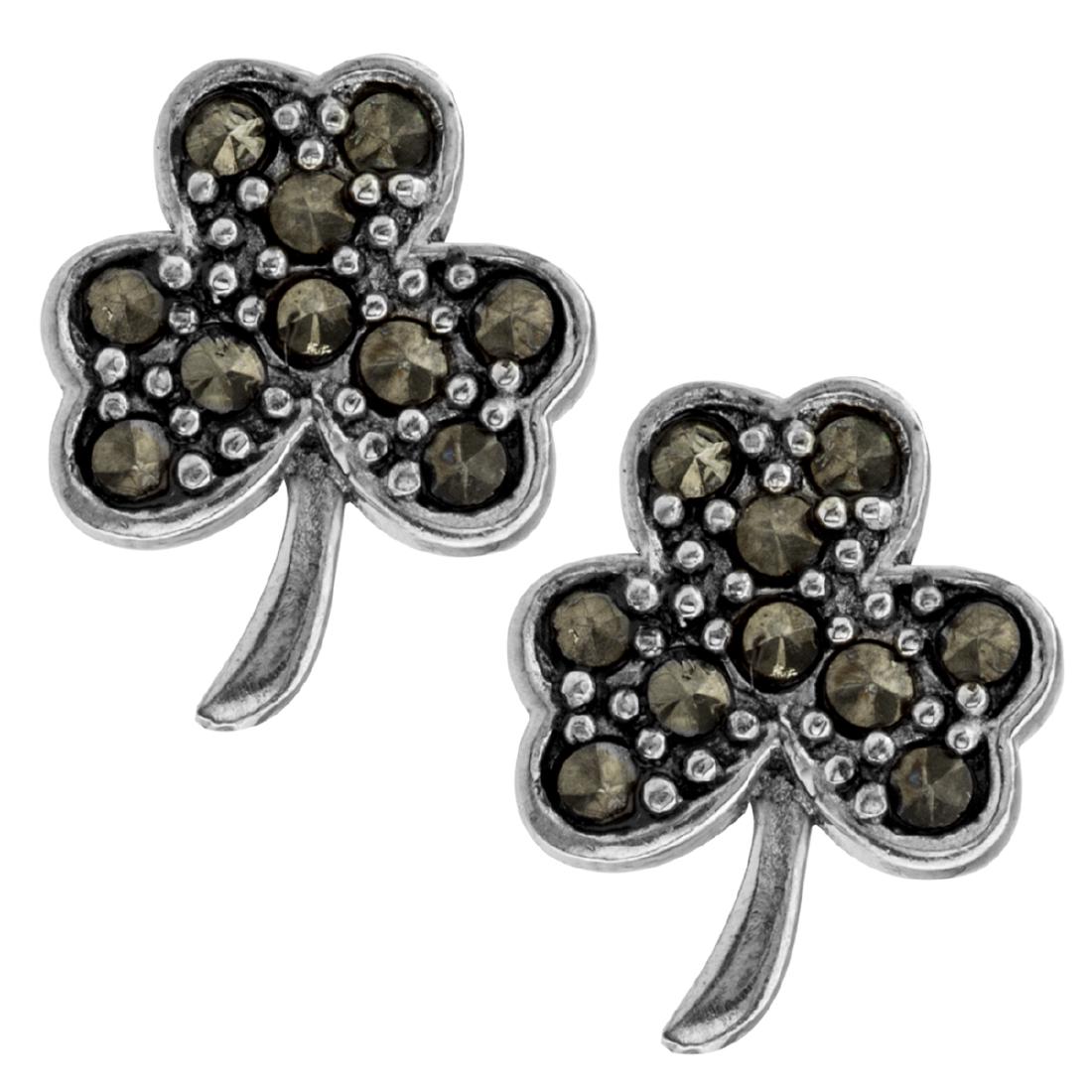 Sterling Silver Marcasite Shamrock Stud Earrings: • Genuine marcasite• Shamrock design studs • Secured butterfly clasp • Gleaming rhodium over fine sterling silver