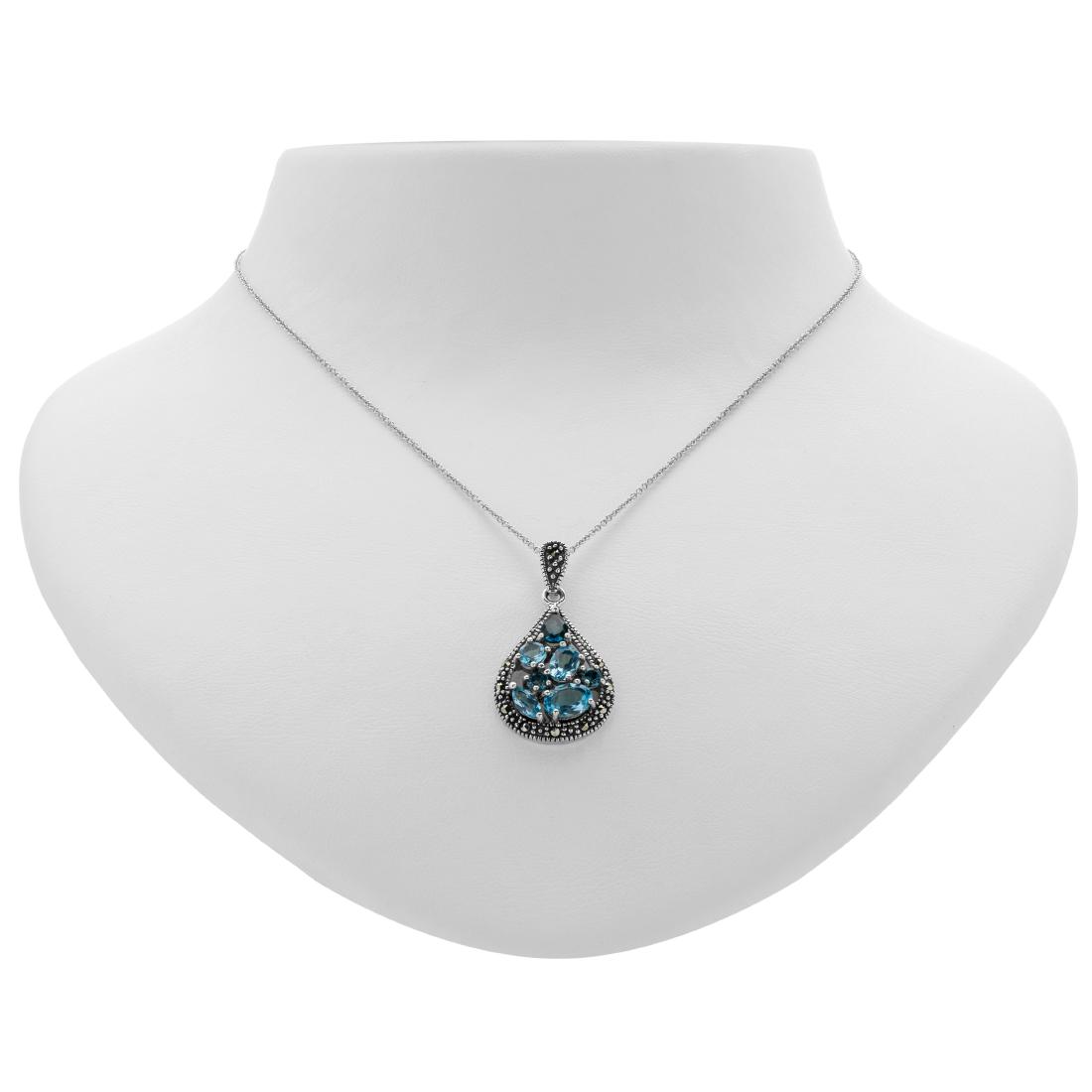 Silver Blue Topaz & Marcasite Teardrop Necklace: Gorgeous, simply gorgeous—that’s Addison Lane’s teardrop necklace from the Felicity Collection. Vintage inspired and beautifully crafted in oxidized sterling silver, this lovely desi