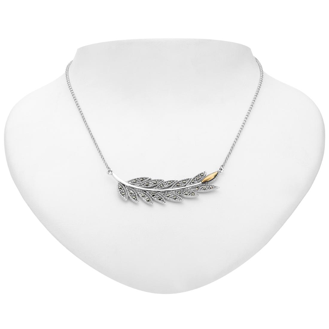 Sterling Silver Marcasite Feather Necklace: Light as a feather, but definitely not stiff as a board! Addison Lane’s charming feather pendant necklace is beautifully crafted in oxidized sterling silver accented with a lustrous bit of gold-