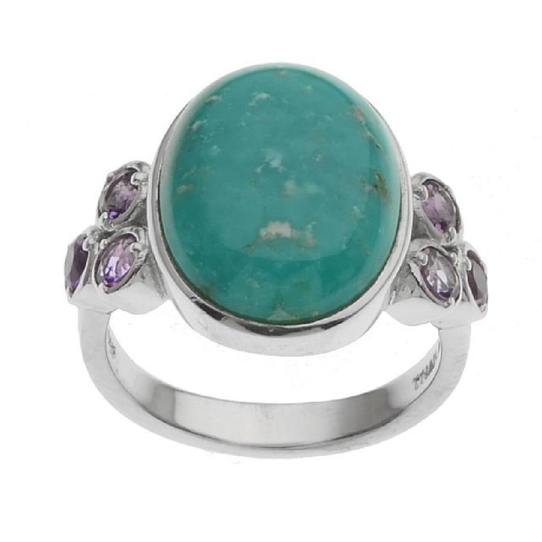 Silver Campo Frio Turquoise & Amethyst Ring-SZ 7: • Genuine campo frio turquoise & amethyst • 0.51ct amethyst • One oval 16x12mm cabochon on the center and gemstones on each sides • Gleaming rhodium over fine sterling silver