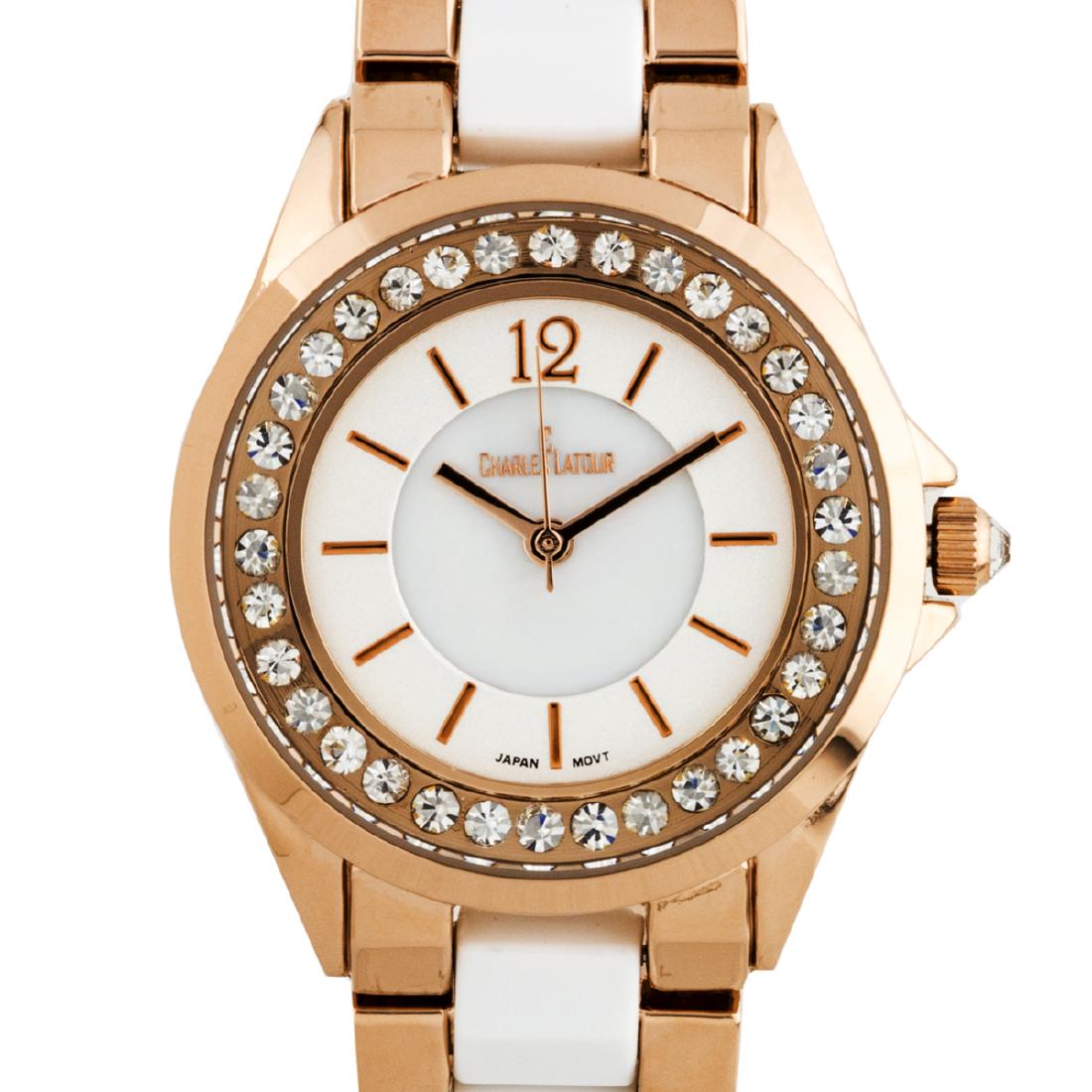 Charles Latour Crystal Bezel Ladies Watch: The Charles Latour has a sleek 34mm case with stunning Czech crystals surround the outer chapter ring. A mirror finish arabic numeral at 12, and a pearlized dial core compliment the variaty of colors 