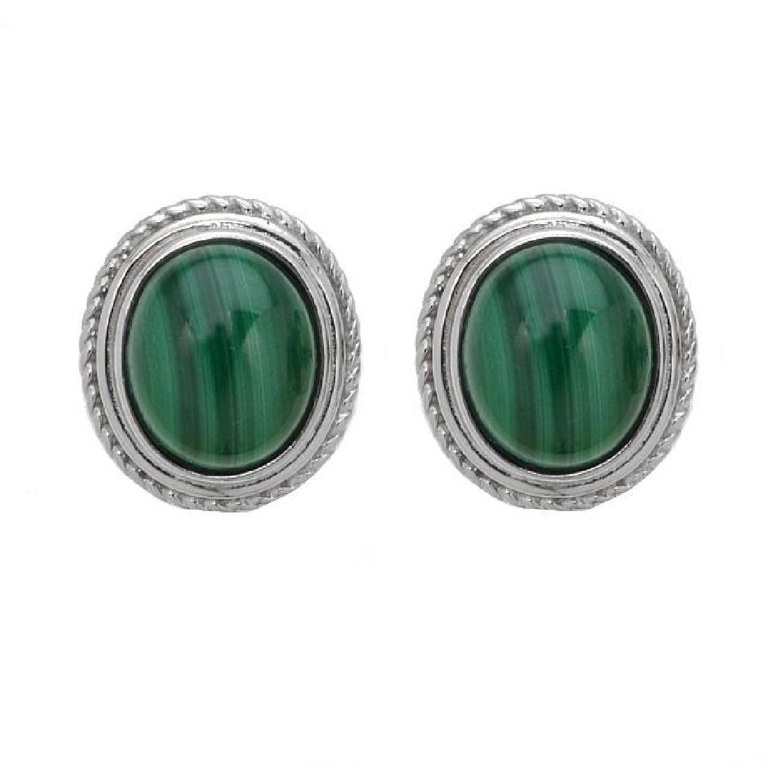 Silver Oval Malachite Rope Textured Stud Earrings: • Genuine malachite • Oval cabochon stone surrounded by the rope texture • Comfortable butterfly clasp • Gleaming rhodium over fine sterling silver