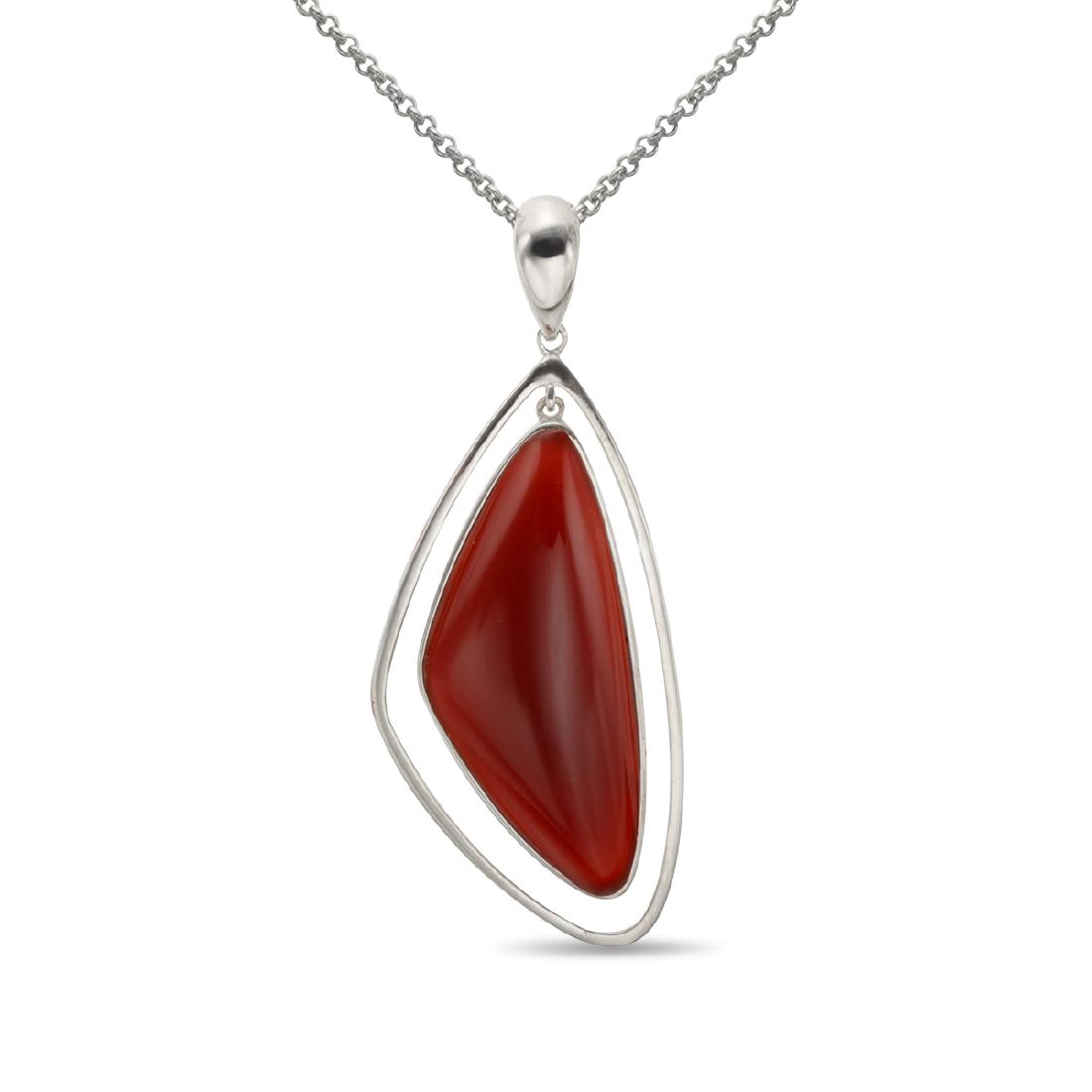 Silver 39x16mm Freefrom Carnelian Pendant: 925 Sterling Silver Brilliant color and beautiful craftsmanship make Pangea Mines sterling silver carnelian pendant a “must have.” You’ll the fiery brilliance of the large 39 x16mm c