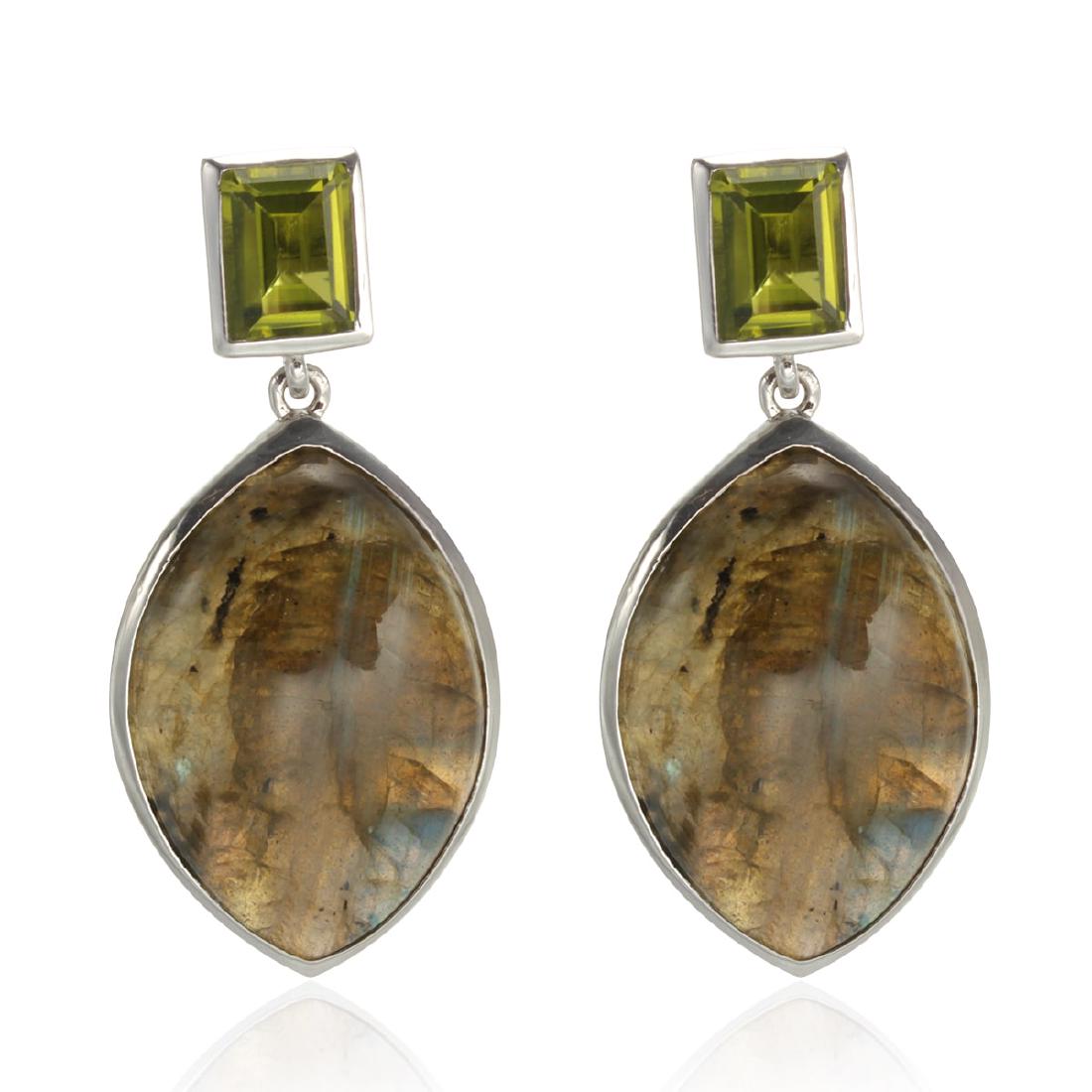 Sterling Silver Labradorite & Peridot Drop Earring: Crafted from sterling silver, these earrings feature sparkling step -cut Peridot with dangling marquise shaped Labradorite cabochons. These earrings will always look as good as you do! Frame your face