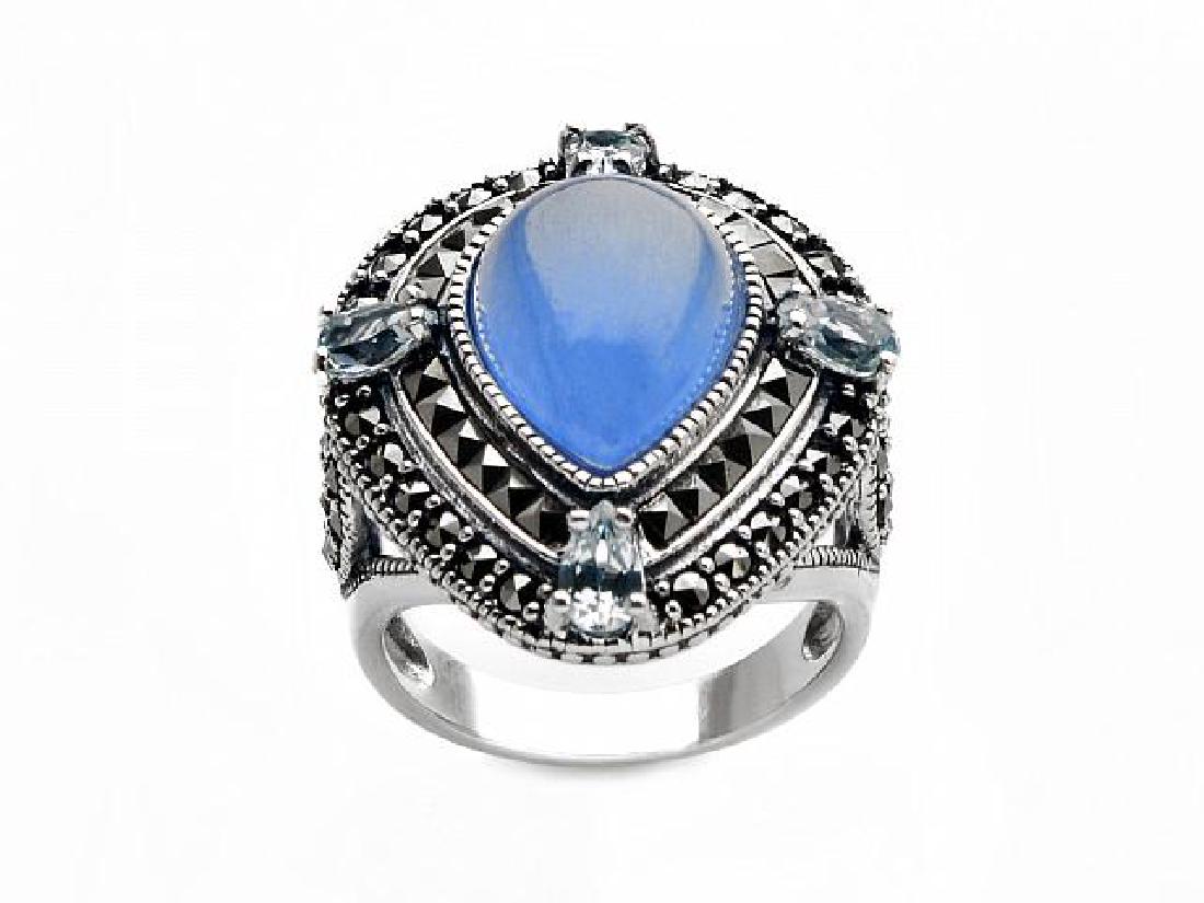 Sterling Silver Blue Jade & Gemstones Ring-SZ 8: • Genuine blue jade, marcasite & sky blue topaz • Pear shaped cabohcon at the center with halo of marcasite around it. • Gleaming rhodium over fine sterling silver