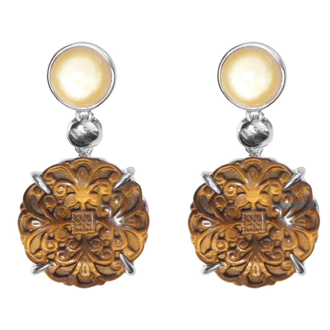 Silver Carved Tiger's Eye & MOP Drop Earrings: • Genuine carved tiger's eye & golden mother of pearl • Floral motif carved on the tiger's eye cabochon • Comfortable butterfly clasp • Gleaming rhodium over fine sterling silv