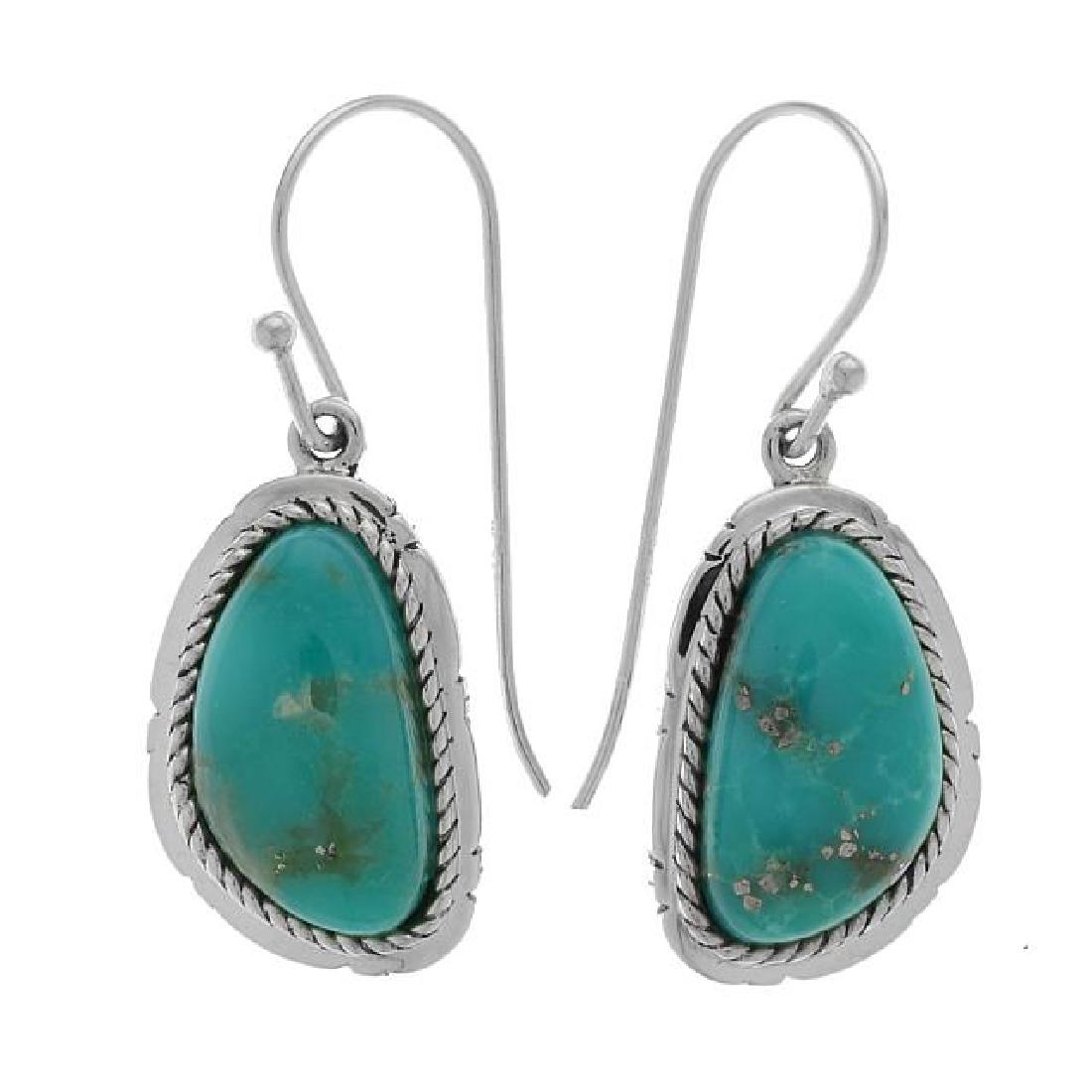 Silver Campo Frio Turquoise Dangle Earring: Heavenly color, lovely styling, beautiful craftsmanship—these earrings from the Pangea Mines Turquoise Mecca Collection have it all. Gorgeous Campo Frio turquoise, mined in America is complement