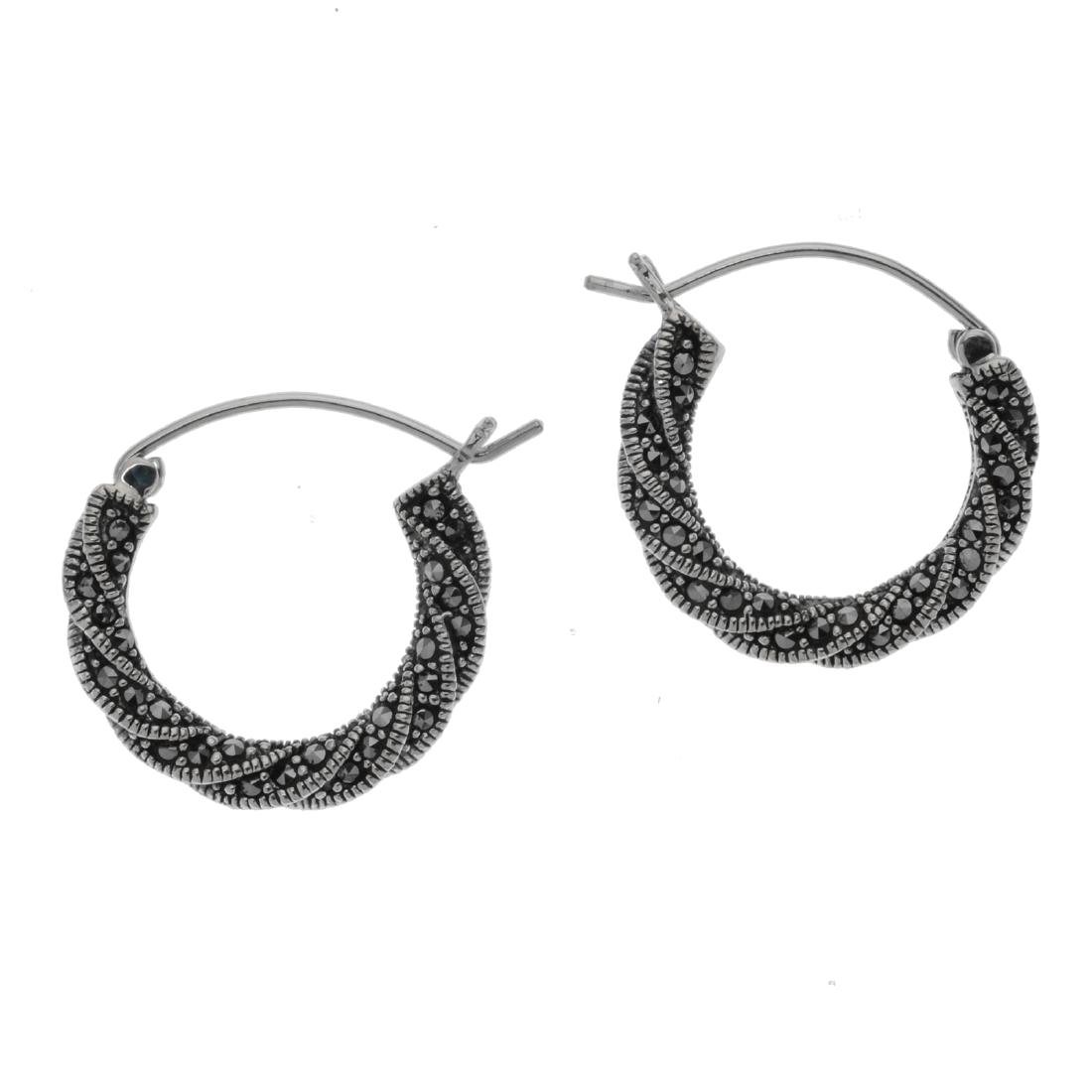Sterling Silver Marcasite Hoop Earrings: • Genuine marcasite • Twisted hoop style • Hinged earback • Gleaming rhodium over fine sterling silver