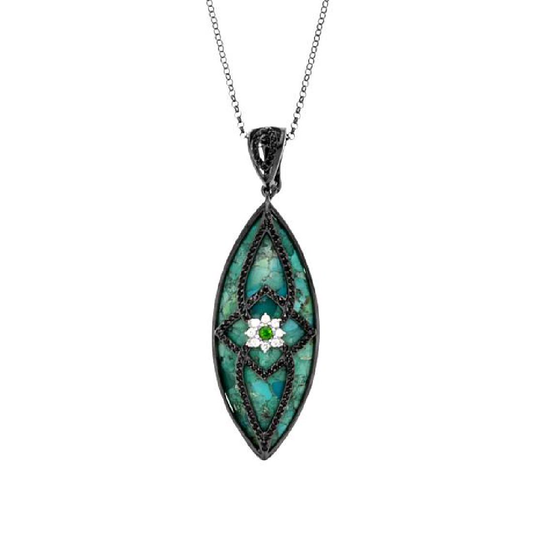 Sterling Silver Turquoise & Multi Gemstone Pendant: • Genuine turquoise, chrome diopside, white zircon & black spinel • 1.1 cwt gemstones • 18” silver chain • Gleaming rhodium over fine sterling silver