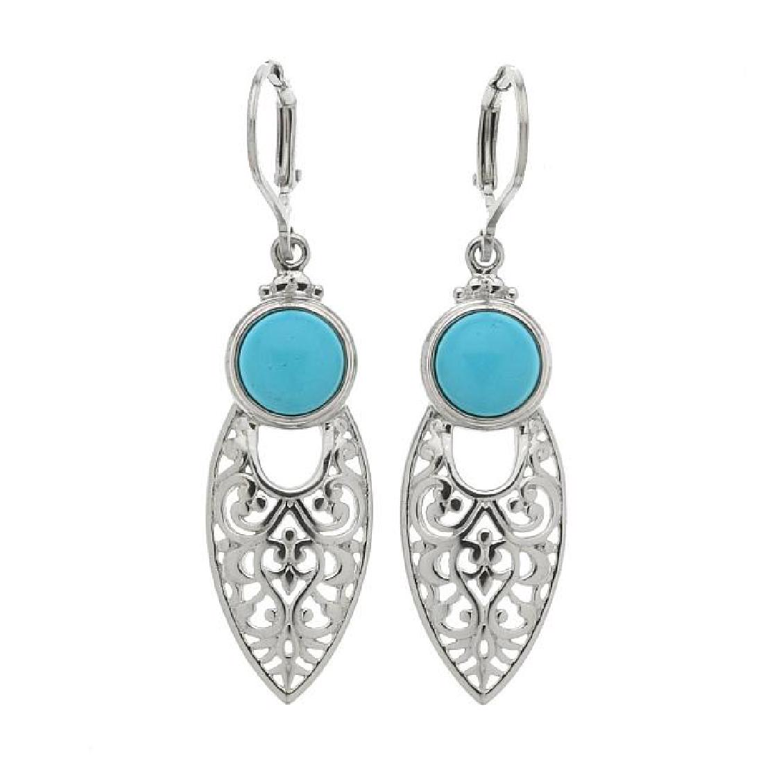 Silver Sonora Beauty Turquoise Drop Earrings: • Genuine sonora beauty turquoise • Marquise shaped with filigree details • Comfortable lever back • Gleaming rhodium over fine sterling silver