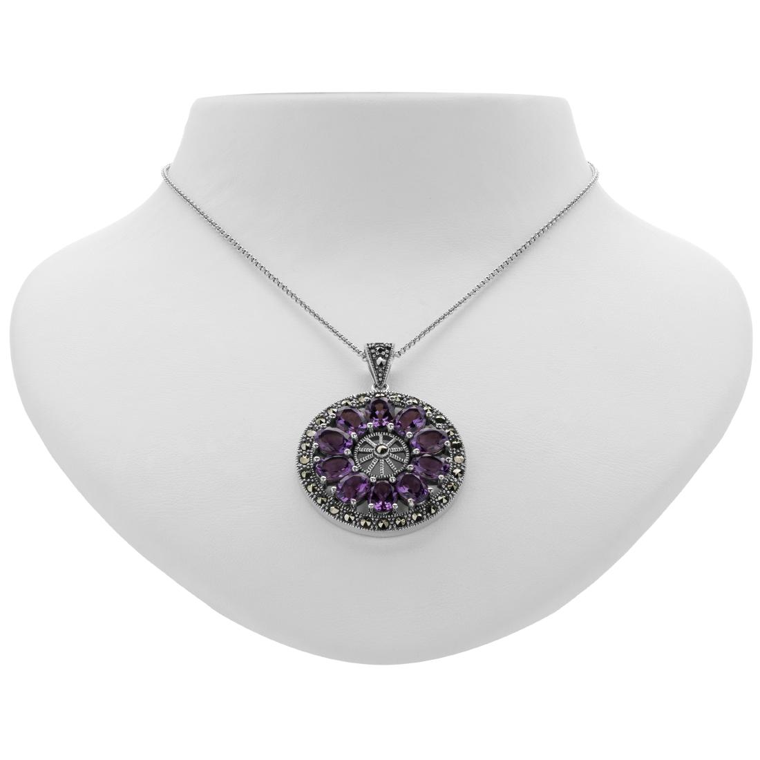 Silver Amethyst & Marcasite Medallion Pendant: Inspired by wonderful vintage looks and classic designs, Addison Lane crafts this lovely medallion pendant necklace from the Felicity Collection. Beautifully styled in oxidized sterling silver and lav