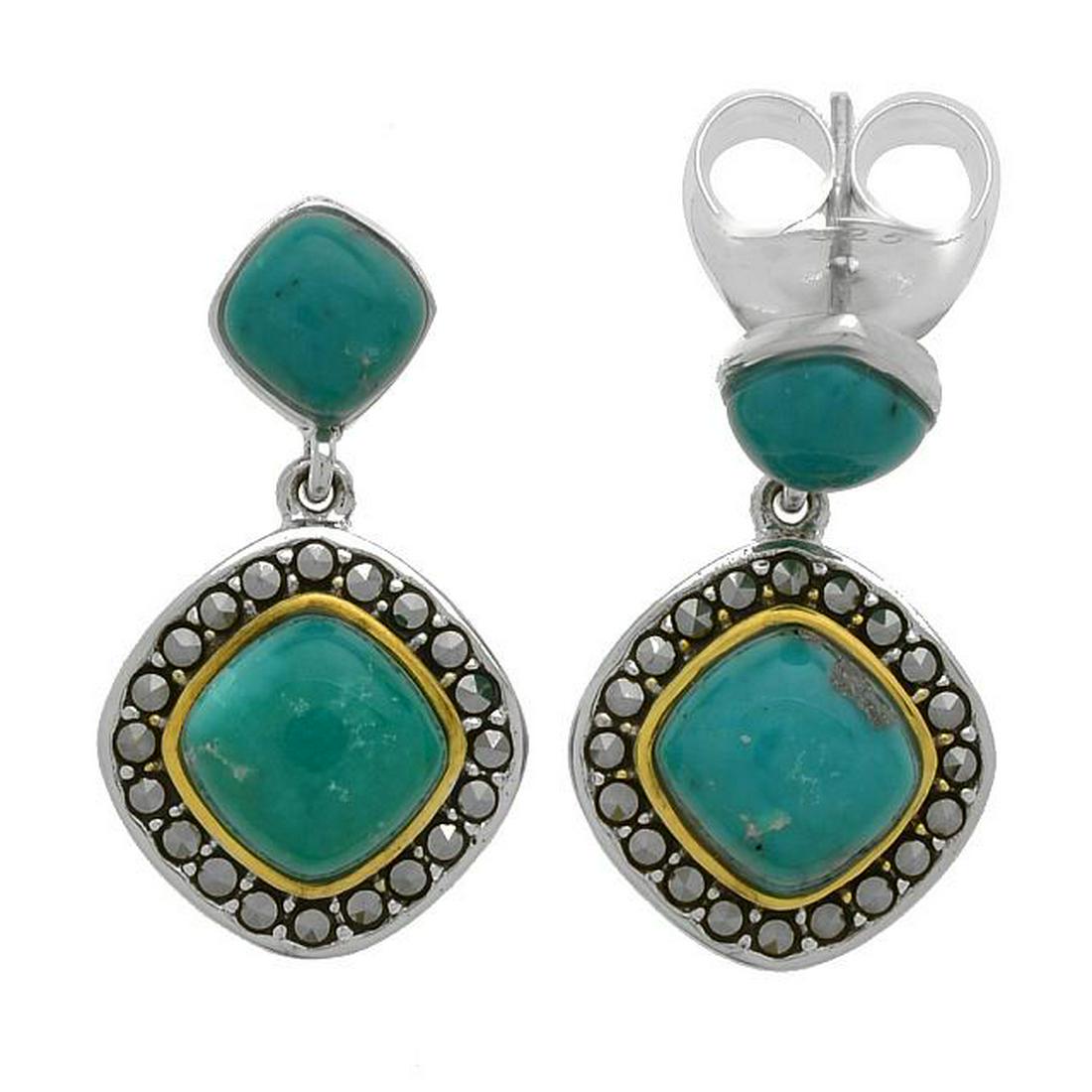 Silver Turquoise & Marcasite Halo Drop Earrings: • Genuine campo frio turquoise & marcasite • Turquoise cabochons with a halo of marcasite on a dangling top • Comfortable butterfly clasp • Gleaming rhodium with 14k gold accen