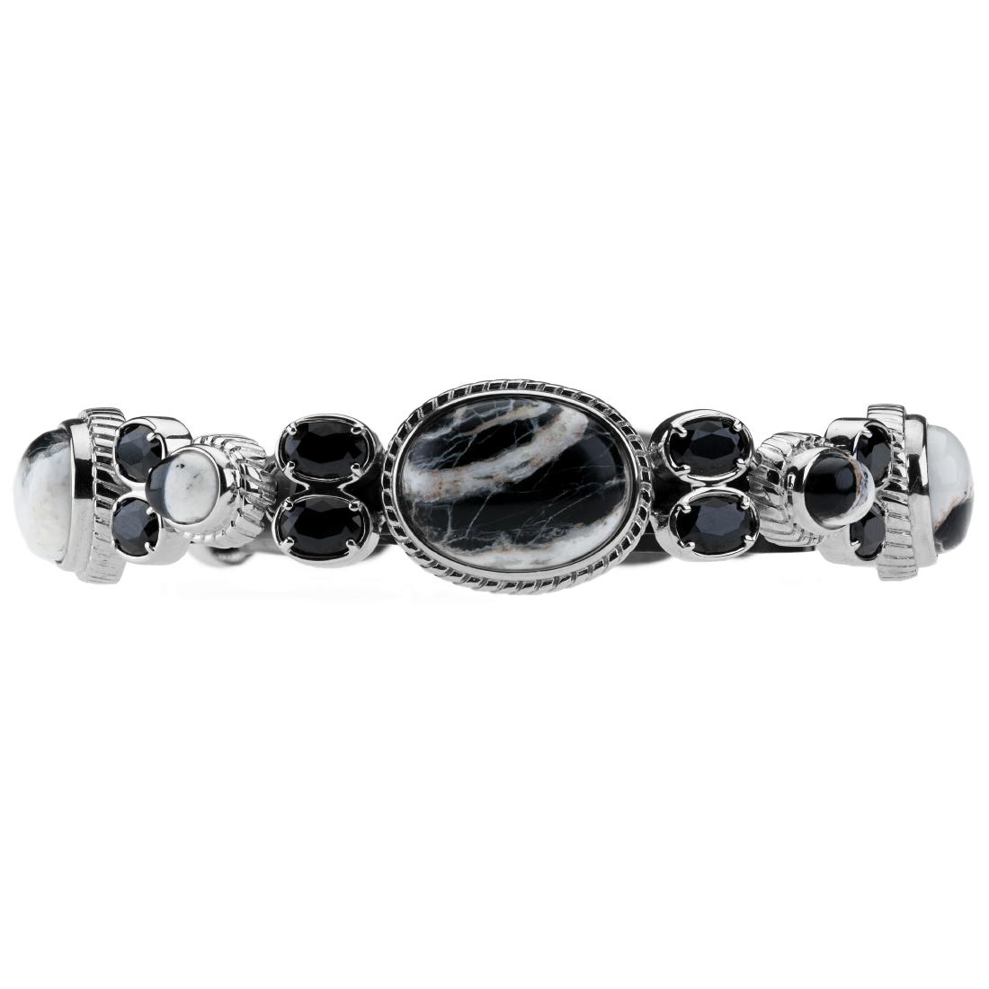 Silver 8.2" White Buffalo & Spine Bracelet: A Shimmering Sequence of Genuine Black Spinel Gemstone contrasts beautifully with the genuine earthy grace of the White Buffalo stone. Crafted in 925 Sterling Silver this unique bracelet will add just