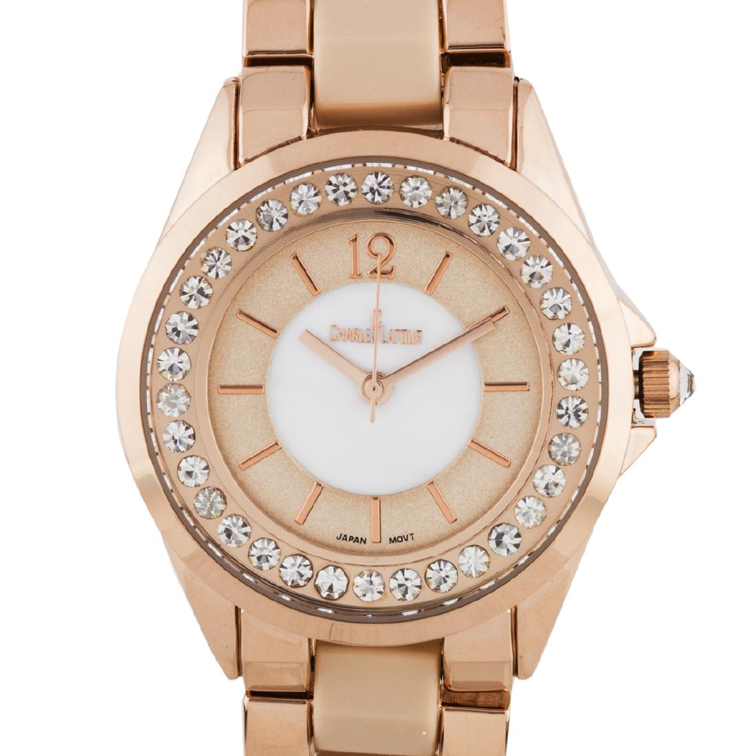 Charles Latour Crystal Bezel Ladies Watch: The Charles Latour has a sleek 34mm case with stunning Czech crystals surround the outer chapter ring. A mirror finish arabic numeral at 12, and a pearlized dial core compliment the variaty of colors 